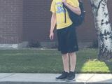 Participant in a Special Olympics shirt before competing