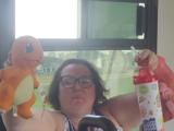Participant holding a plush toy she picked out